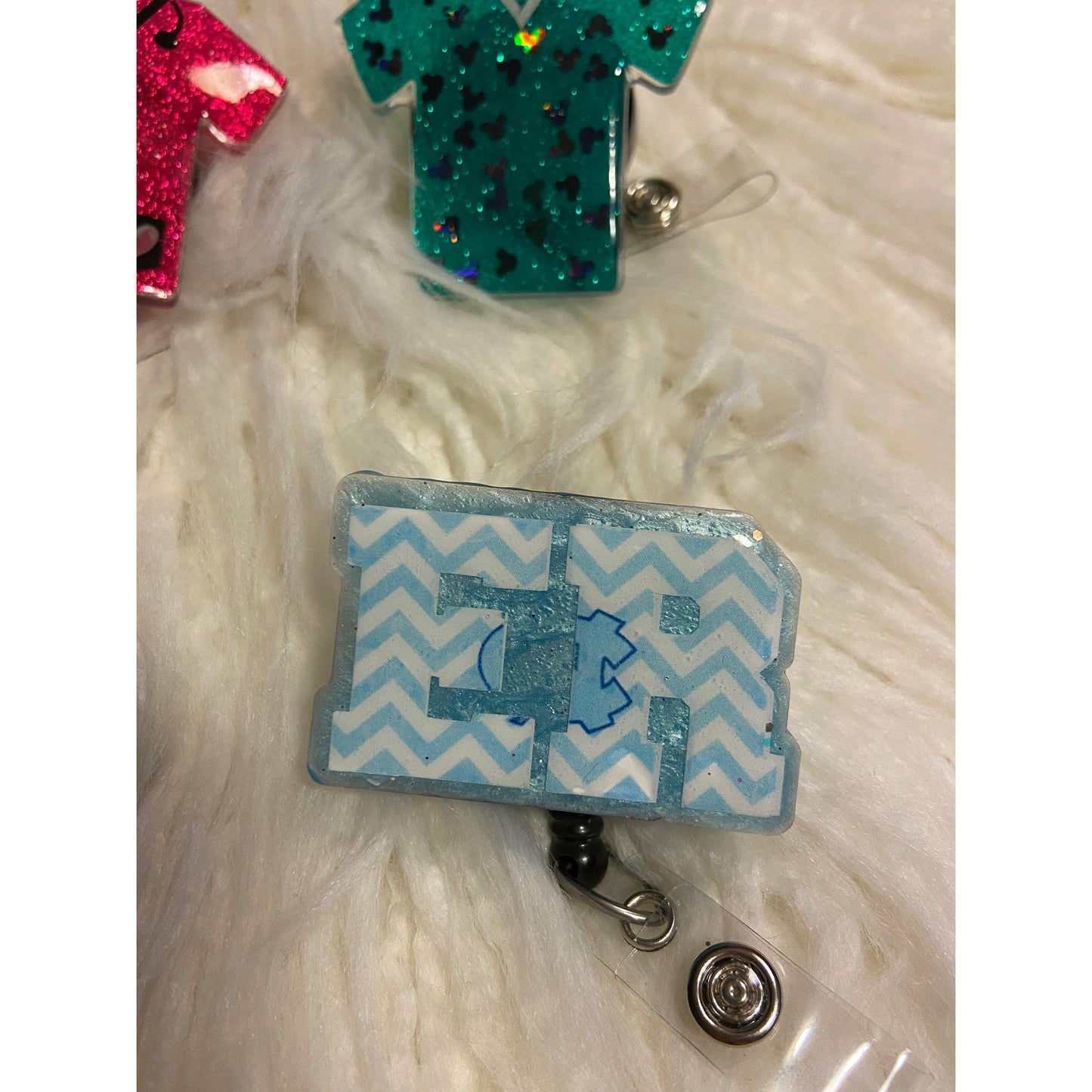 Glitter badge reels