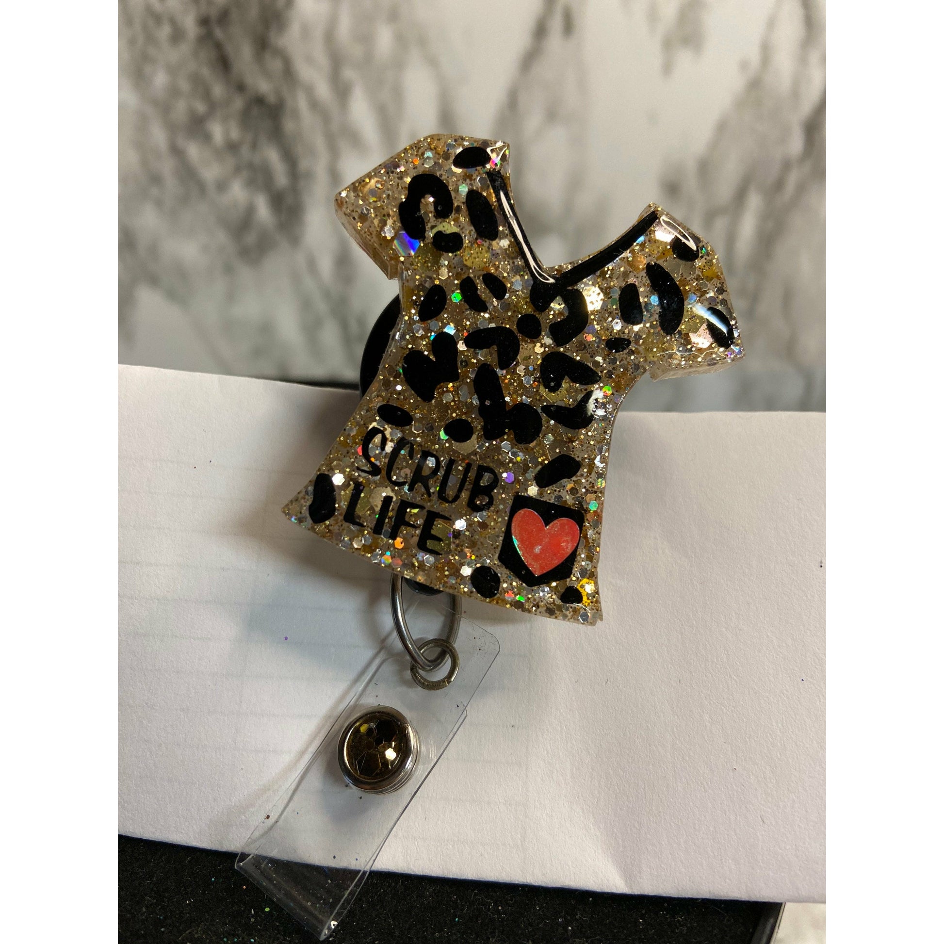 Leopard print scrub top badge reel. Gold scrub top badge reel.