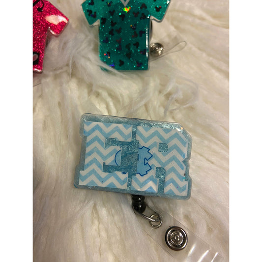 Glitter badge reels